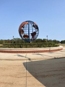 Metal globe sculpture